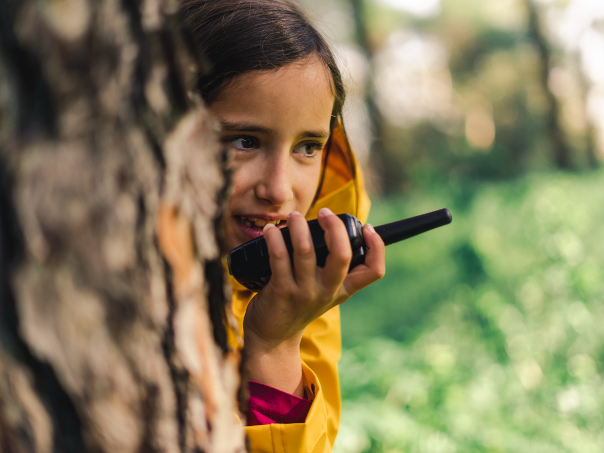 Girl playing with connected toys